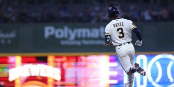 Joey Ortiz rounds the bases after hitting a home run.