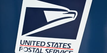 WASHINGTON, DC MAY 27: A United States Postal Service (USPS) logo is seen on a mailbox in Washington, District of Columbia, May 27, 2025. (Photo by STR/NurPhoto via Getty Images)