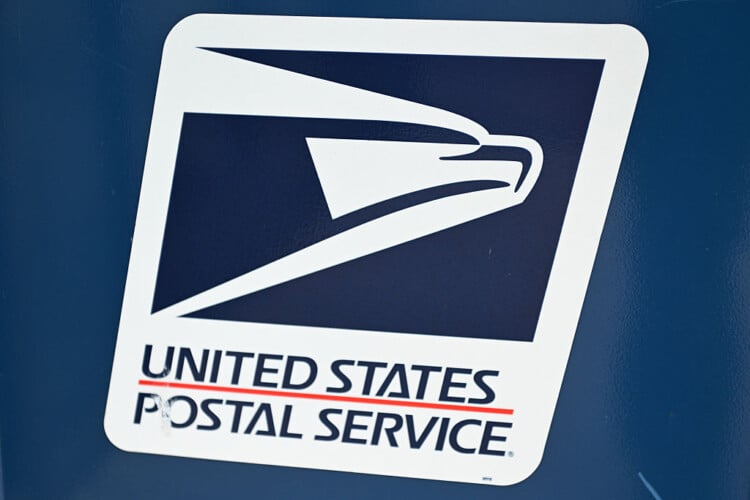 WASHINGTON, DC MAY 27: A United States Postal Service (USPS) logo is seen on a mailbox in Washington, District of Columbia, May 27, 2025. (Photo by STR/NurPhoto via Getty Images)