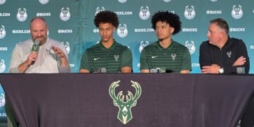 From left to right: Milwaukee Bucks head coach Taylor Jenkins, Nate Ament, Brayden Burries and Bucks general manager Jon Horst. (Neil Doyle/WTMJ)