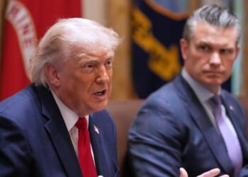President Donald Trump speaks during a Cabinet meeting at the White House, Wednesday, May 27, 2026, in Washington, as Secretary of Defense Pete Hegseth, looks on. (AP Photo/Jacquelyn Martin)