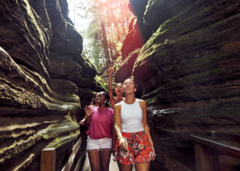 Friends Group Walk Through Witches Gulch In Wisconsin Dells