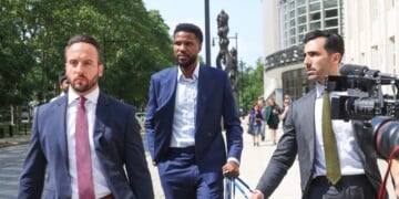 Former NBA player Malik Beasley, center, exits Brooklyn federal court, Wednesday, July 1, 2026, in New York. (AP Photo/Heather Khalifa)