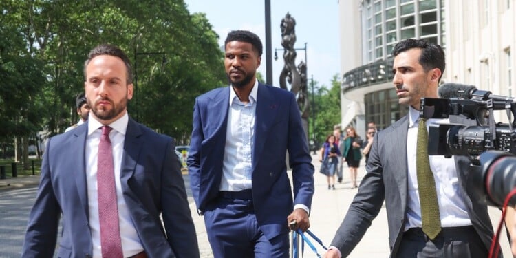 Former NBA player Malik Beasley, center, exits Brooklyn federal court, Wednesday, July 1, 2026, in New York. (AP Photo/Heather Khalifa)