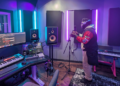 Milwaukee-area high school senior Ty rehearses a track from his first EP at a Running Rebels music studio in Milwaukee. Image credit: Jessica Gatzow