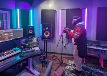 Milwaukee-area high school senior Ty rehearses a track from his first EP at a Running Rebels music studio in Milwaukee. Image credit: Jessica Gatzow