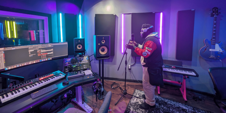 Milwaukee-area high school senior Ty rehearses a track from his first EP at a Running Rebels music studio in Milwaukee. Image credit: Jessica Gatzow