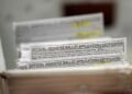 FILE - Absentee ballots during a count at the Wisconsin Center, Nov. 8, 2022, in Milwaukee. (AP Photo/Morry Gash, File)