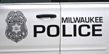 MILWAUKEE, WI - AUGUST 28: The Milwaukee Police Department logo is seen on the side of a vehicle outside the venue prior to an MLB game between the Milwaukee Brewers and the Arizona Diamondbacks on August 28, 2025, at American Family Field in Milwaukee, WI. (Photo by Patrick Gorski/Icon Sportswire via Getty Images)