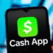 CANADA - 2025/12/21: In this photo illustration, the Cash App logo is seen displayed on a smartphone screen. (Photo Illustration by Thomas Fuller/SOPA Images/LightRocket via Getty Images)