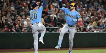 Brewers begin long road trip with 11-inning 7-4 victory over Diamondbacks in Arizona