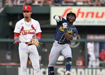 Luis Lara celebrates after collecting his first MLB hit and RBI at Busch Stadium.