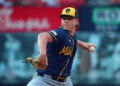 Kyle Harrison throws a pitch at Busch Stadium.