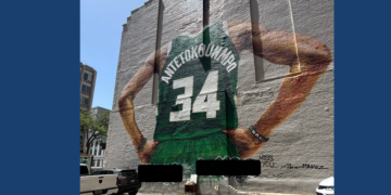 Graffiti covered the Giannis mural located at Jackson and Wisconsin in downtown Milwaukee.
