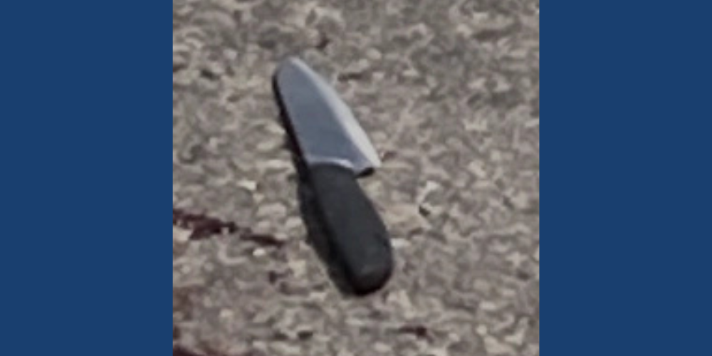 A fix-blade knife recovered from the scene of an officer-involved shooting that left a suspect dead in Madison's Marquette Neighborhood on July 22, 2026. Image courtesy of Madison Police Department.