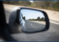 Passenger side rear view mirror showing blind spot