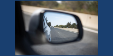 Passenger side rear view mirror showing blind spot