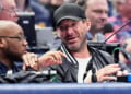 FILE - Former NFL quarterback Tony Romo, right, attends an NBA basketball game between the Indiana Pacers and the Dallas Mavericks on March 5, 2024, in Dallas. (AP Photo/Tony Gutierrez, File)