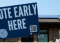 A voter walks to polling place in Milwaukee, Tuesday, July 28, 2026. (AP Photo/Nam Y. Huh)