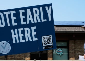A voter walks to polling place in Milwaukee, Tuesday, July 28, 2026. (AP Photo/Nam Y. Huh)