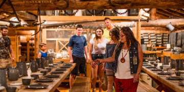 Family Looking At Cook Shanty Exhibit At Menominee Nation Cultural Museum In Keshena (Photo: Travel Wisconsin)
