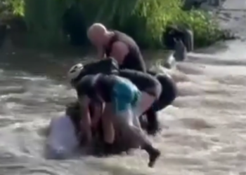 bicyclist flooding rescue