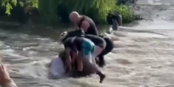 bicyclist flooding rescue