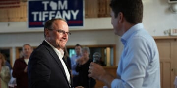 Republican gubernatorial candidate Tom Tiffany, left, shakes hands with Bryan Steil, the U.S. Representative for Wisconsin's 1st congressional district during a campaign event, Wednesday, July 29, 2026, in Kenosha, WI. (AP Photo/Nam Y. Huh)