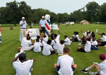 Former Green Bay Packers wide receiver Jordy Nelson (front right) and Bank of America Wisconsin president Drew Slocum (front left) speak to the youth participants before the golf clinic on Monday, August 10, 2026. (Neil Doyle/WTMJ)