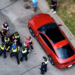 Drone video shows a struggle between Madison officers and the city's independent police monitor. Image courtesy of Madison Police Department