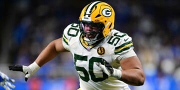 Green Bay Packers offensive tackle Zach Tom looks to block during the second half of an NFL football game against the Detroit Lions in Detroit, Nov. 27, 2025. (AP Photo/David Dermer, File)