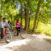 Family biking on a trail in Peninsula State Park