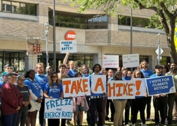 Wisconsin Conservation Voters gathered outside the We Energies office in downtown Milwaukee on Monday, Aug. 24, 2026, to oppose the utility company's current rate proposal for 2027 and 2028. (Neil Doyle/WTMJ)