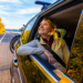 Woman Smile From Car Window Traveling Down Scenic Road In Pepin County (Photo: Travel Wisconsin)