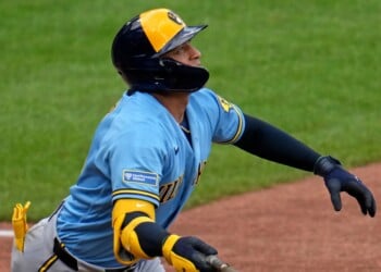 Milwaukee Brewers' Bo Naylor (14) watches his solo home run off Pittsburgh Pirates pitcher Luke Weaver during the eighth inning of a baseball game in Pittsburgh, Thursday, Sept. 17, 2026. (AP Photo/Gene J. Puskar)