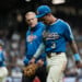 Milwaukee Brewers' Joey Ortiz exits the field with a trainer after suffering an injury during the eighth inning of a baseball game against the St. Louis Cardinals, Friday, Sept. 25, 2026, in Milwaukee. (AP Photo/Aaron Gash)
