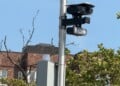 Flock camera, automated license plate reading (ALPR) systems made by Flock Safety, that capture vehicle details and upload the data to a searchable cloud database used by law enforcement. (Photo by: Lindsey Nicholson/UCG/Universal Images Group via Getty Images)