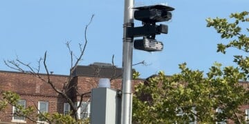 Flock camera, automated license plate reading (ALPR) systems made by Flock Safety, that capture vehicle details and upload the data to a searchable cloud database used by law enforcement. (Photo by: Lindsey Nicholson/UCG/Universal Images Group via Getty Images)