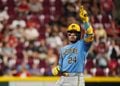 William Contreras celebrates a double at second base at Great American Ballpark.