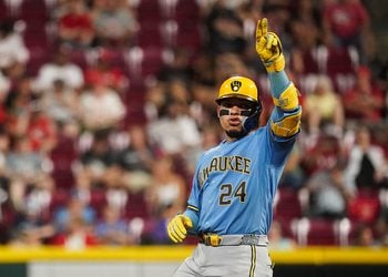 William Contreras celebrates a double at second base at Great American Ballpark.