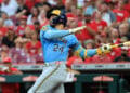 William Contreras swings at a pitch at Great American Ballpark in Cincinnati.