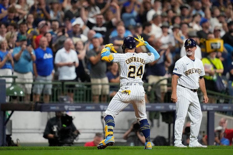 William Contreras celebrates after hitting a home run at American Family Field.