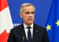 Canadian Prime Minister Mark Carney delivers a speech in the hemicycle of the European Parliament in Strasbourg, eastern France, as part of a trip during which he welcomed a proposal by European Commission President for Canada to become the EU's first associate member, on September 17, 2026. Canadian Prime Minister Mark Carney on September 17, 2026, rejected threats by US President Donald Trump over Ottawa's push for closer ties with the European Union. (Photo by Jean-Christophe VERHAEGEN / AFP via Getty Images)