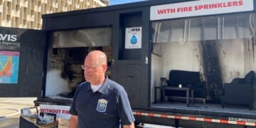 Fire Chief Aaron Lipski outside the demonstration fires (Photo: Elizabeth Lintonen)