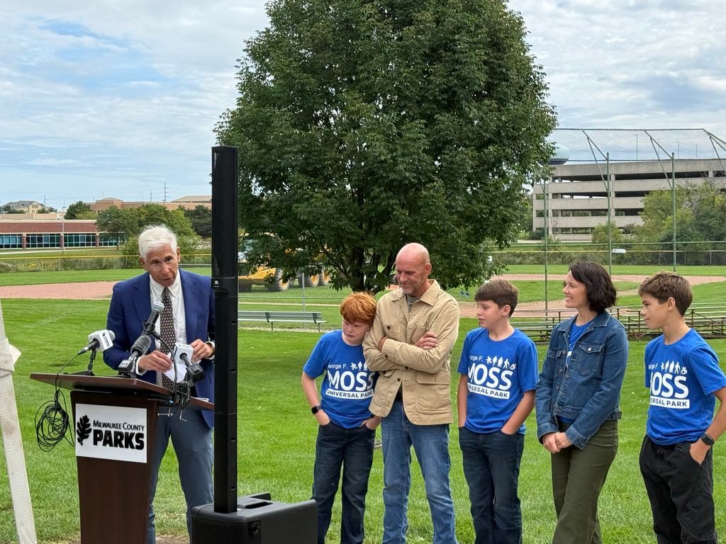 Damian Buchman, his family, and Children's Wisconsin Pediatrician-in-Chief Dr. David Margolis at Moss Universal Park (Pic: Nazir Spencer)
