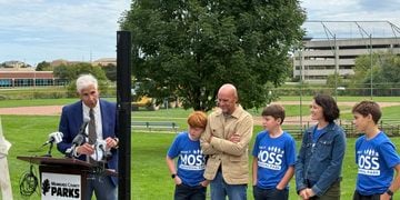 Damian Buchman, his family, and Children's Wisconsin Pediatrician-in-Chief Dr. David Margolis at Moss Universal Park (Pic: Nazir Spencer)