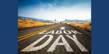 'Labor Day" painted on an empty road