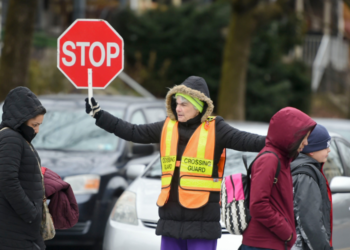 EVERYDAY HERO: Crossing guard risks life to save children