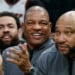 FILE - Milwaukee Bucks head coach Doc Rivers, center, applauds during the first half of an NBA basketball game against the Dallas Mavericks, March 31, 2026, in Milwaukee. (AP Photo/Jeffrey Phelps, File)