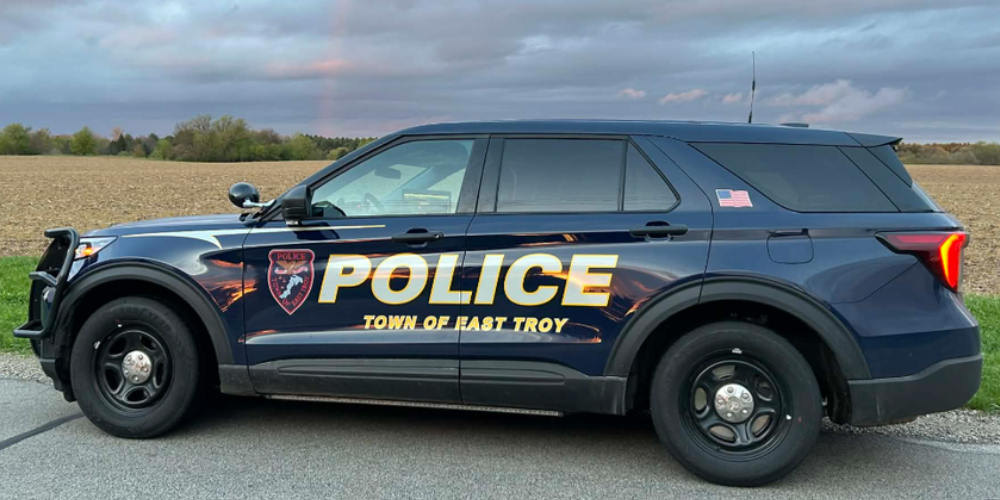 Small plane carrying four crashes into East Troy cornfield